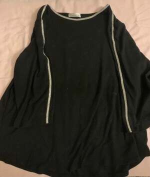 Black sweater with silver trim on sleeves